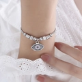 Silver bead bracelet featuring a vintage evil eye charm with sparkling zircon accents - E451-Steel Color Bracelet