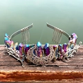 Close-up of rainbow crystal crown with silver hollow moon and branch details on hair comb - Multicolor