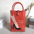 Orange knitted handbag featuring a high heel pattern and Happy Women's Day text - Orange High Heels Letter Pattern
