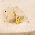 Polished golden letter M pendant crafted in stainless steel for personalized necklaces - Letter-M / Gold