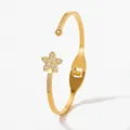 Polished gold flower bangle with crystal-set petals and a flexible open-cuff design - Five-Petal Flower Gold Style (SAK924)