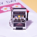 Portachiavi mini slot machine argento con leva rossa e icone di frutta colorate - Argento con fibbia a D