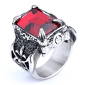 Macro shot of vintage silver ring with square red gemstone and ornate side carvings - US 7 / Silver Tone + Ruby