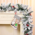 Detail of burlap Christmas stocking featuring a 3D gnome doll and festive embroidery - Beige