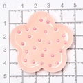 Pink star-shaped miniature dollhouse plate with polka dots shown on a scale mat - Flower Plate / Pink