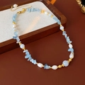 Detail of aquamarine and pearl necklace featuring gold beads and a golden clasp - Gold Blue Pearl Aquamarine Necklace (#57)