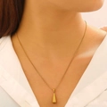 Elegant gold-tone drop pendant necklace on model showcasing minimalist fashion jewelry style - 18K Gold Plated Stainless Steel Minimalist Drop Necklace (12210)