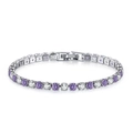 Detail view of silver tennis bracelet with alternating purple and white cubic zirconia stones - 17cm / White Gold + White Purple