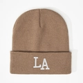 Close-up of premium 3D LA embroidery on warm brown ribbed knit winter beanie hat - Dark Khaki