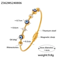 Gold evil eye bangle made of titanium steel with sparkling rhinestones and magnetic clasp - Gold