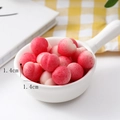 Miniature TPR peach squishy toy bowl showing 1.4cm size details and matte texture - New Red Peach