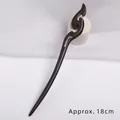 Minimalist ebony wood hair pin with hollow cloud carving in vintage style, length 18cm - Yuan Di