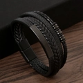 Detailed close-up of multilayer braided black leather bracelet with sleek metal plate - 21cm / Black + Matte Black