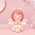 Pink resin money box featuring a cute girl with rabbit ears and angel wings design - Large Pink Money Box