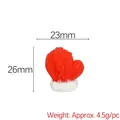 Miniature red resin Christmas glove with knit texture and dimensions 23mm by 26mm - Red and White Gloves
