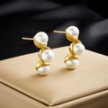 Elegant gold S-curve earrings with three white pearls on a display box, high quality - Gold S-Shape Triple Pearl Style (E4963)