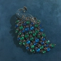 Spilla a pavone vintage in bronzo con cristalli blu e verdi intarsiati dal design unico - Verde Pavone