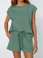 Detail of sage green lounge set showing ribbed cotton texture and drawstring shorts - S / Malachite green