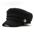 Dettaglio del berretto newsboy nero in pelliccia sintetica con corda e bottone in metallo - M(56-58cm) / Nero