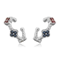 Detailed view of silver clover ear bone clip set with red and blue cubic zirconia stones - Platinum Multi Zirconia