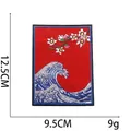 Detail of embroidered Great Wave and Sakura patch with 12.5cm x 9.5cm dimensions - No. 2 (Wave Cherry Red Background)