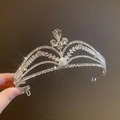 Silver bridal tiara with sparkling crystals and a central faux pearl on a metal headband - Pearl Rhinestone Crown / Silver