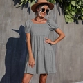 Detailed view of grey short sleeve knit dress with square neck and layered ruffle hem - XS / Gray