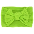 Detail of neon green jacquard nylon baby headband with a soft oversized bow decoration - Fruit Green