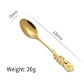 Cucchiaino da caffè dorato in acciaio inox con rilievo rosa, lungo 128mm e 20g - Cucchiaio / Oro