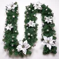 Close-up of 2.7m luxury Christmas garland with white poinsettias and silver ornaments - Premium Decorated Style / Silver