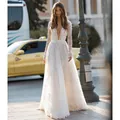 Elegant white lace long sleeve wedding dress with deep V-neck and floral pattern details - S / Dresses / White