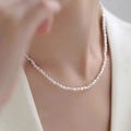 Close-up of model wearing a natural baroque freshwater pearl necklace for women - Baroque Pearl Minimalist Choker (C-d-021)
