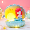 Pastel blue shell night light with little mermaid figure and warm glowing ball - Mermaid Shell Lamp