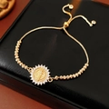 Detail of adjustable gold bracelet with a round zircon-embossed medal on leather - Round Virgin Mary Medal Style (Gold)
