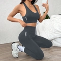 Dark grey two-piece yoga set with sports bra and high waist leggings featuring gymwear logo - S / Dark Gray