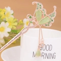 Elegant rose gold butterfly hair pin with green gemstones and long flowing tassels - Rose Gold Butterfly Light Green Cat's Eye Tassel (FZ016)