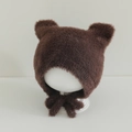 Detail of dark brown faux fur baby hat featuring cute bear ears and long side ties - 10 Months - 2 Years / Coffee