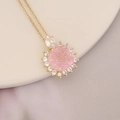 Macro shot of 18K gold necklace featuring a pink square gem and white diamond accents - Square Frosted Pink Gem (10#)