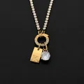 Collana in acciaio inossidabile dorato con ciondolo lettera K e zircone - Lettera K