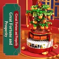 Chinese New Year Orange Tree building block music box with festive red base and lucky charms - Fortune Orange Tree Music Box