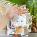Detailed close-up of a plush cat keychain with mushroom hat and gold ring accessory - Gold Lobster Clasp / Grey Patchwork (Mushroom Hat)