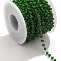 DIY jewelry chain with emerald green faceted beads and gold wire on white spool - Gold-Green