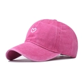 Detail view of the rose red washed cotton baseball cap with a white heart embroidery - Adjustable / Rose Red