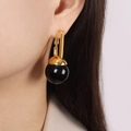 Elegante goldene geometrische Ohrringe mit schwarzem Perlenanhänger für Damen - Schwarze Perle Goldene Ohrringe / Schwarz