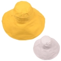 Flat lay of wide brim sun hats in bright yellow and light beige cotton fabric - Yellow