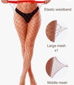 Detail of red fishnet tights featuring elastic waistband with large and middle mesh patterns - Large Mesh / Red