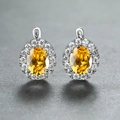 Elegant champagne gold oval earrings with yellow gemstones and diamond micro-pave - White Gold With Yellow Zircon