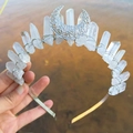 Detail of handcrafted silver wire crown with natural crystals and hollow crescent moon - White