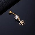 Gold butterfly navel ring with white zircon stones and tassel pendant on black background - High Bowtie Butterfly Gold