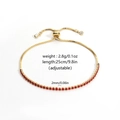 Adjustable gold-tone tennis bracelet featuring a row of 2mm round red cubic zirconia stones - Red Round Fine Zirconia Adjustable Bolo Bracelet (Style 5)